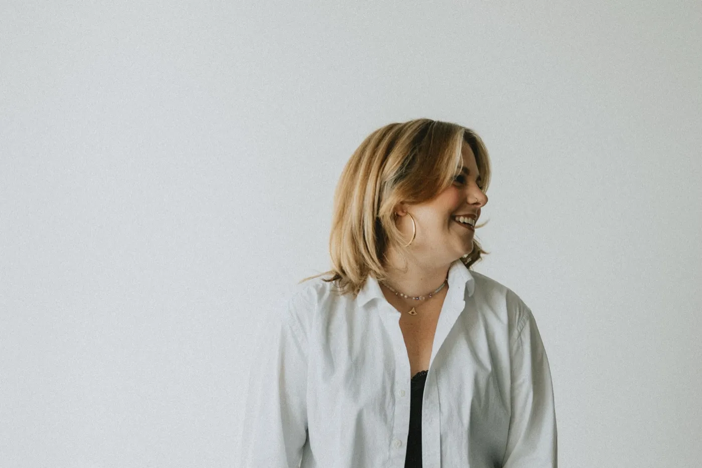 Clémence Tillerot laughing, looking over her shoulder